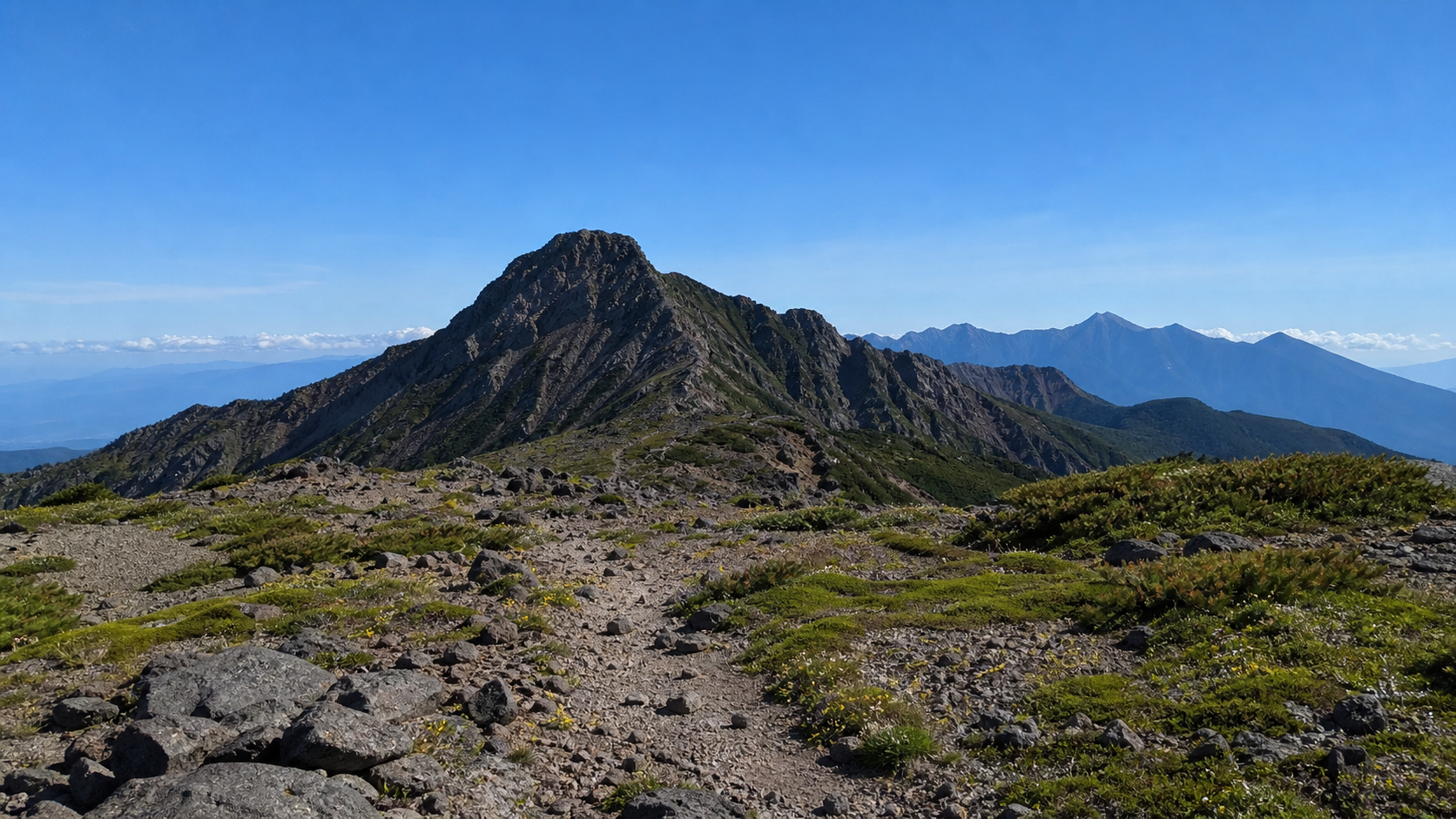 岩稜と八ヶ岳赤岳をイメージした画像